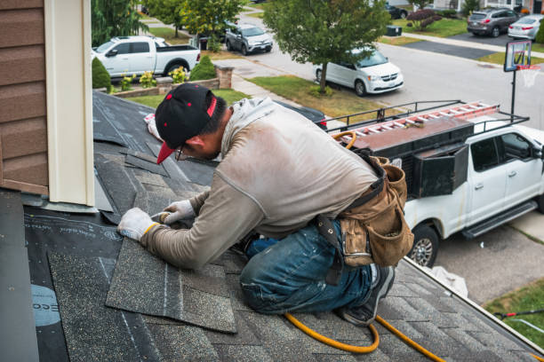 Professional Roofing technician working in Mansfield Center, CT